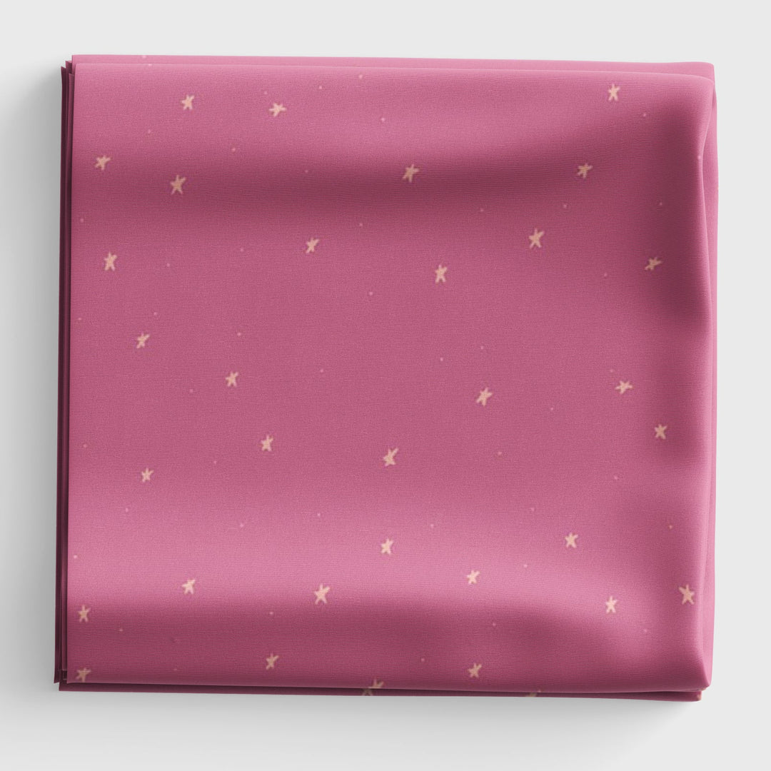 Pink fabric with light pink stars 
